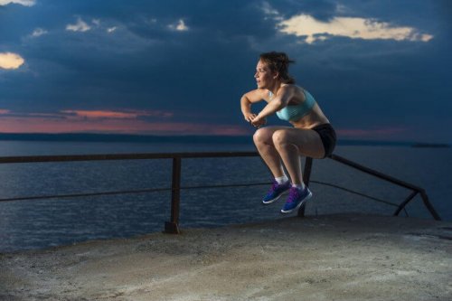 Knees to chest jumping squats