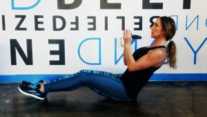 Sit-ups with a kettlebell