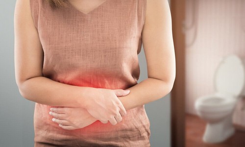 Woman with upset stomach