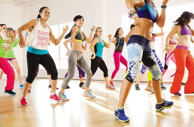 A group of womem taking a zumba class