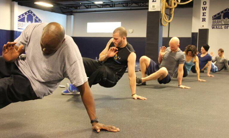 A group of people during an animal flow class