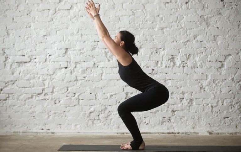 Woman doing the chair pose