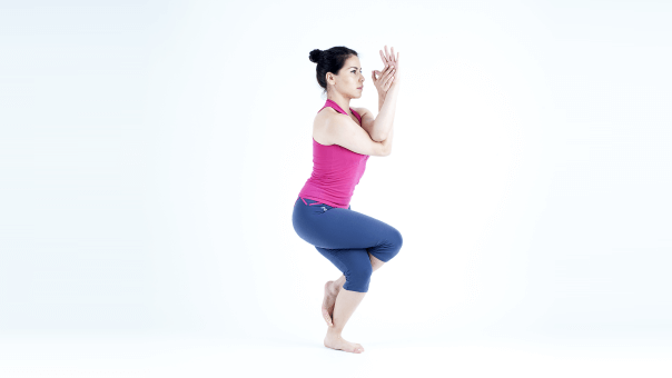 Woman doing the eagle pose