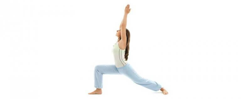Woman doing the Warrior I pose