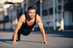 Push-ups, one of the classic bodyweight exercises for men.