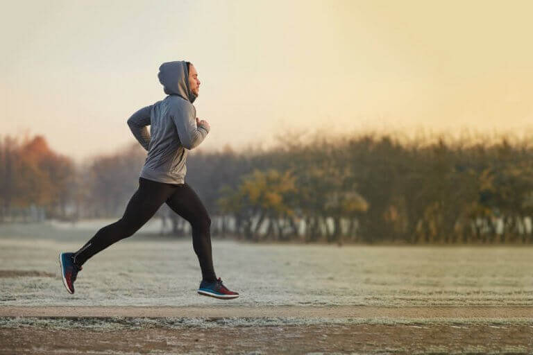 A man running in the sand
