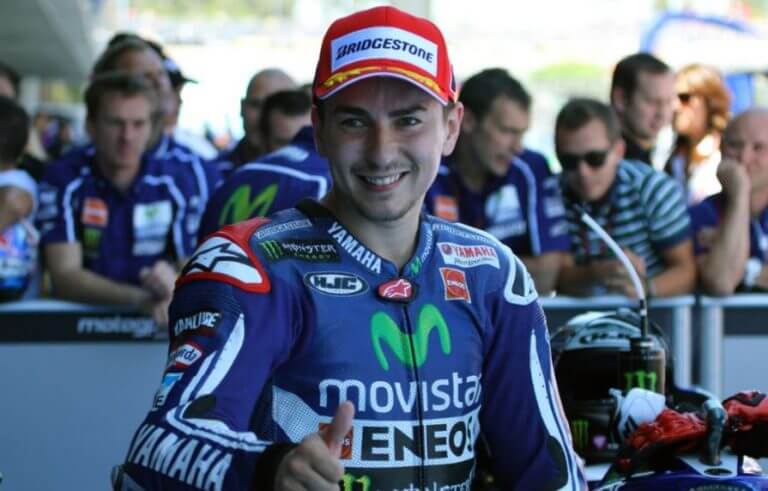 Jorge Lorenzo making a thumbs up sign after a moto GP race