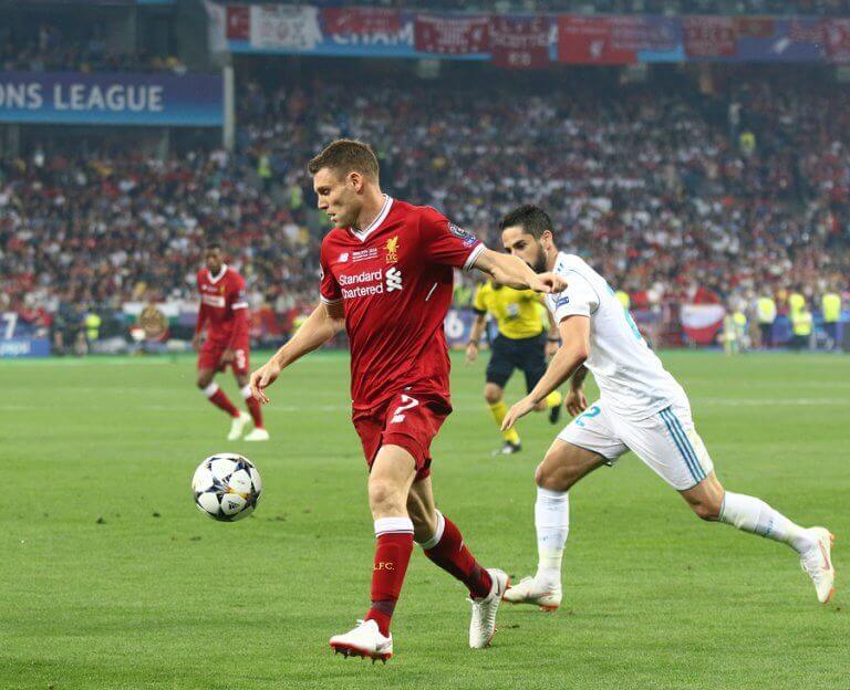 Two soccer players during an international game that applied the new rules for soccer