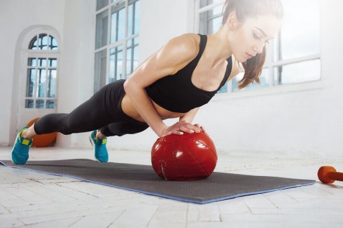 Chest push-ups can also be done on a medicine ball dynamic workout routine.