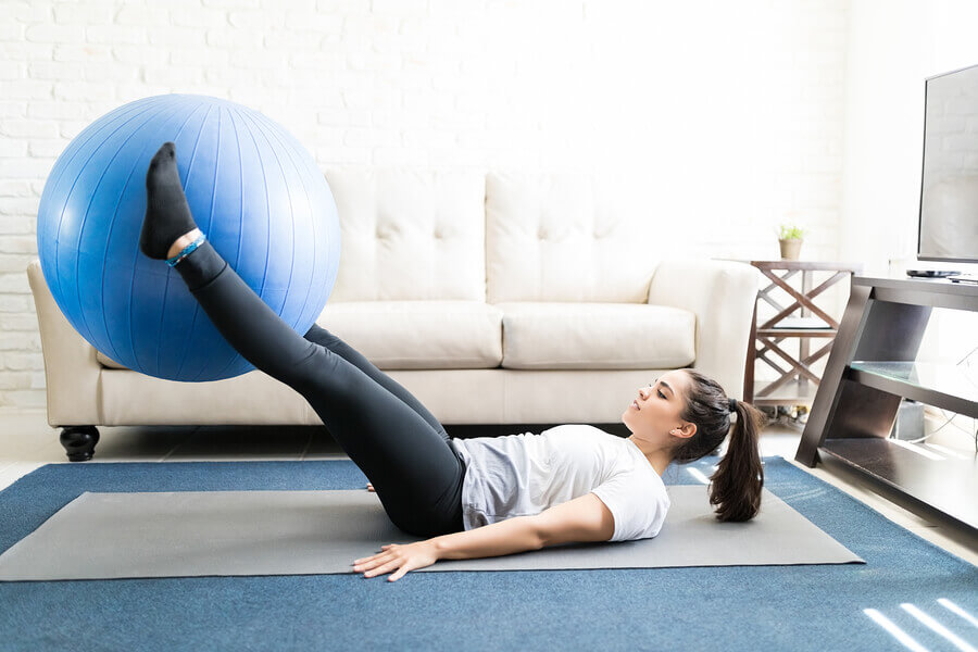 Swiss ball leg lifts