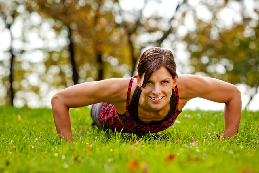 Woman push-ups to strengthen breast area