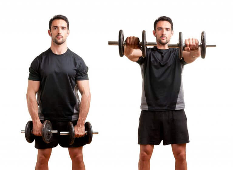 A man doing frontal arm lifts with dumbbells to train his shoulders