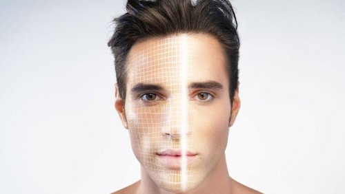 Facial recognition technology scanning a mans face.