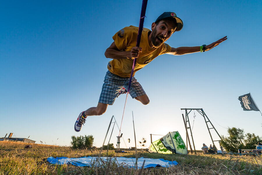 Slackliner falling off of his rope.