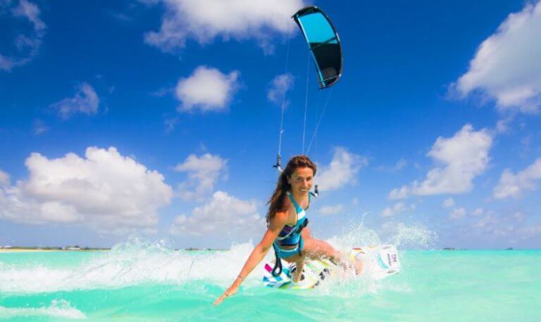 A girl doing kitesurf