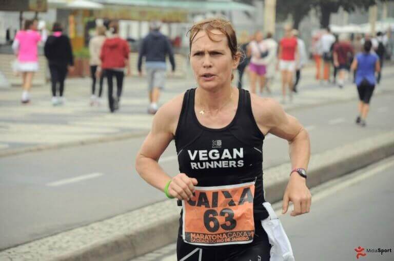 Fiona Oakes running a marathon and representing professional vegan athletes