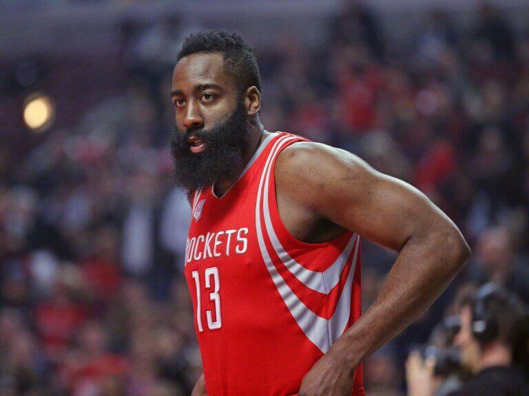 James Harden wearing a red Rockets basketball shirt