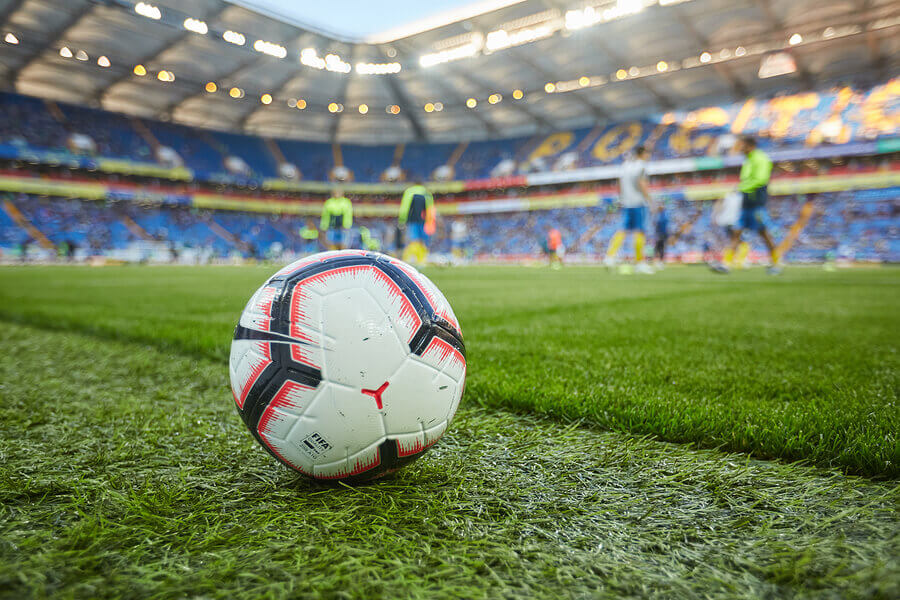 Soccer ball in the stadium while discussing what is restricted