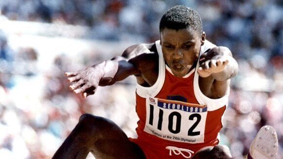 Photo of Carl Lewis doing the long jump, as described in the text