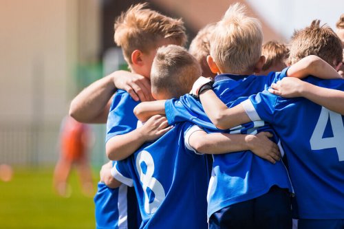 Young boys on a soccer team which are not covered by sports association regulations.
