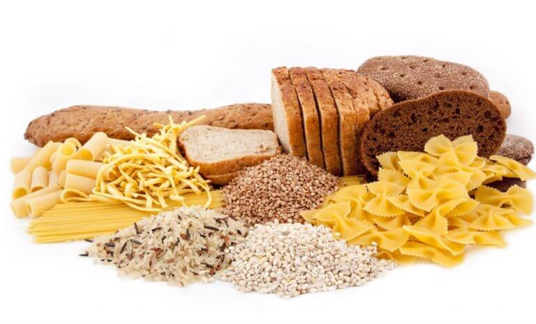 Different types of complex carbs like grains and bread to gain muscle