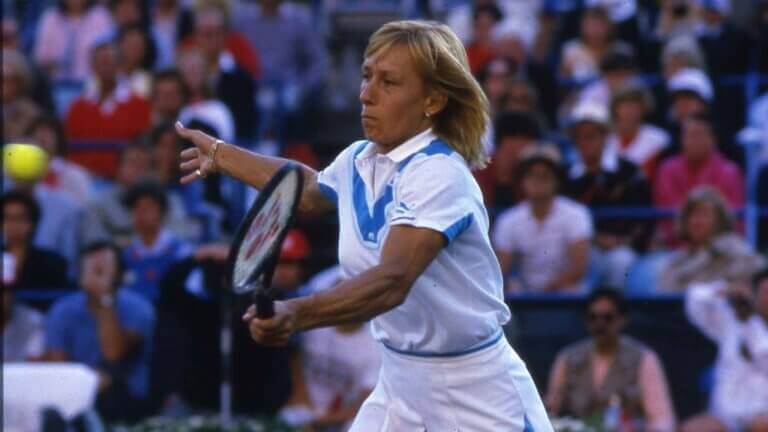 Martina Navratilova playing tennis as described in the text.