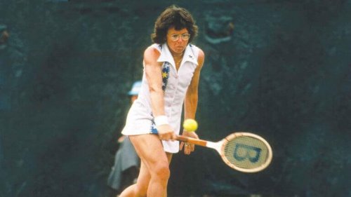 Billie Jean King on court, supporting the subject of the text