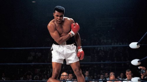 Muhammad Ali knocking someone down.