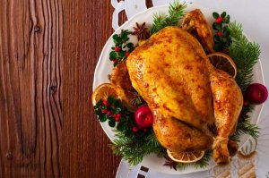 A cooked turkey on a platter.