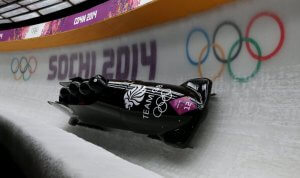 A team of bobsledders competing in the Olympics.