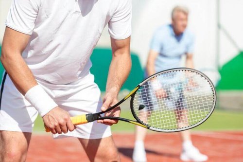 A man playing doubles.