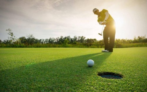 A man playing golf.