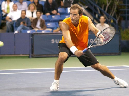 A photo of Pete Sampras playing tennis.
