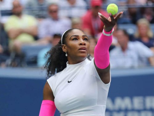 Serena Williams serving the ball.