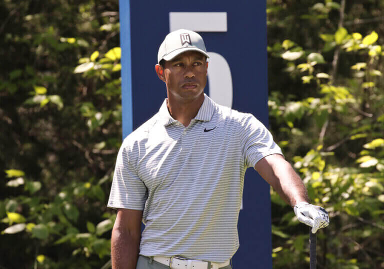 Tiger Woods holding his golf stick