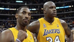 Kobe Bryant and Shaquille O'Neal on the court.