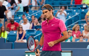 Roger Federer playing tennis.