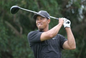 Tiger Woods playing golf.