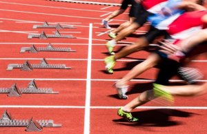 Track and field runners in a competition.