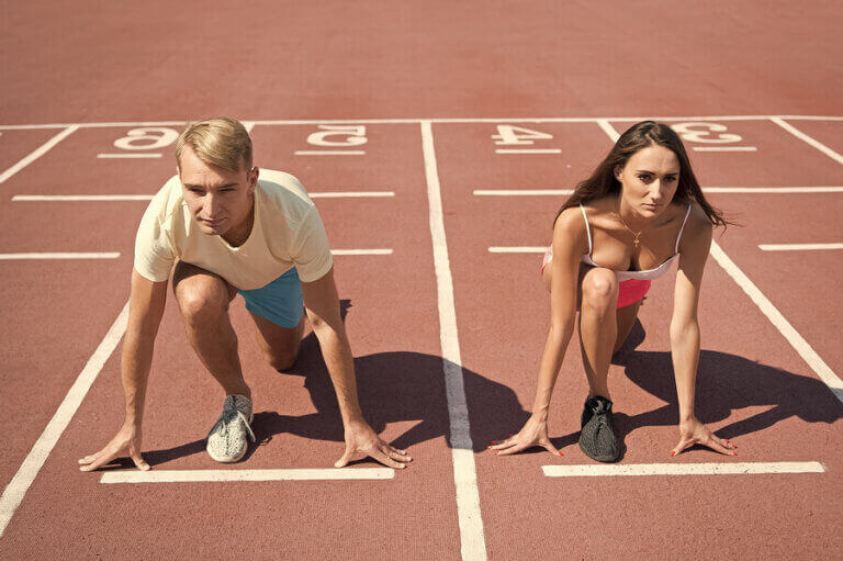 A man and a woman getting ready to practice athletics