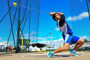 A man performing a hammer throw.