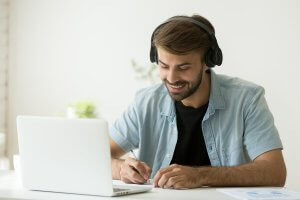 A man studying at home.