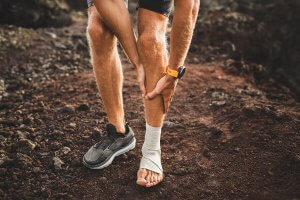 A man walking with shin splints.