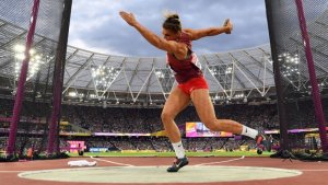 A woman throwing the discus.