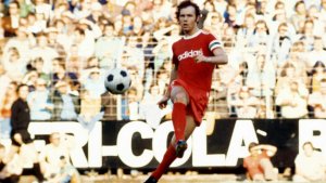Franz Beckenbauer playing a pass.