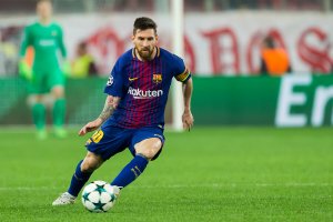 Lional Messi playing for Barcelona.