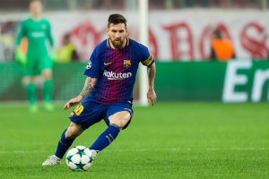 Lional Messi playing for Barcelona.