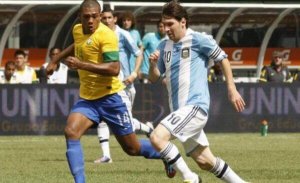 Messi playing in one of the hottest soccer rivalries.