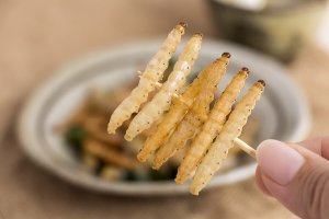 Six insects on a stick.