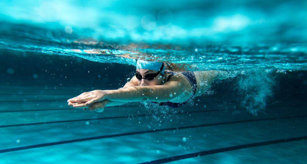 A hypertensive person swimming to keep their disease under control